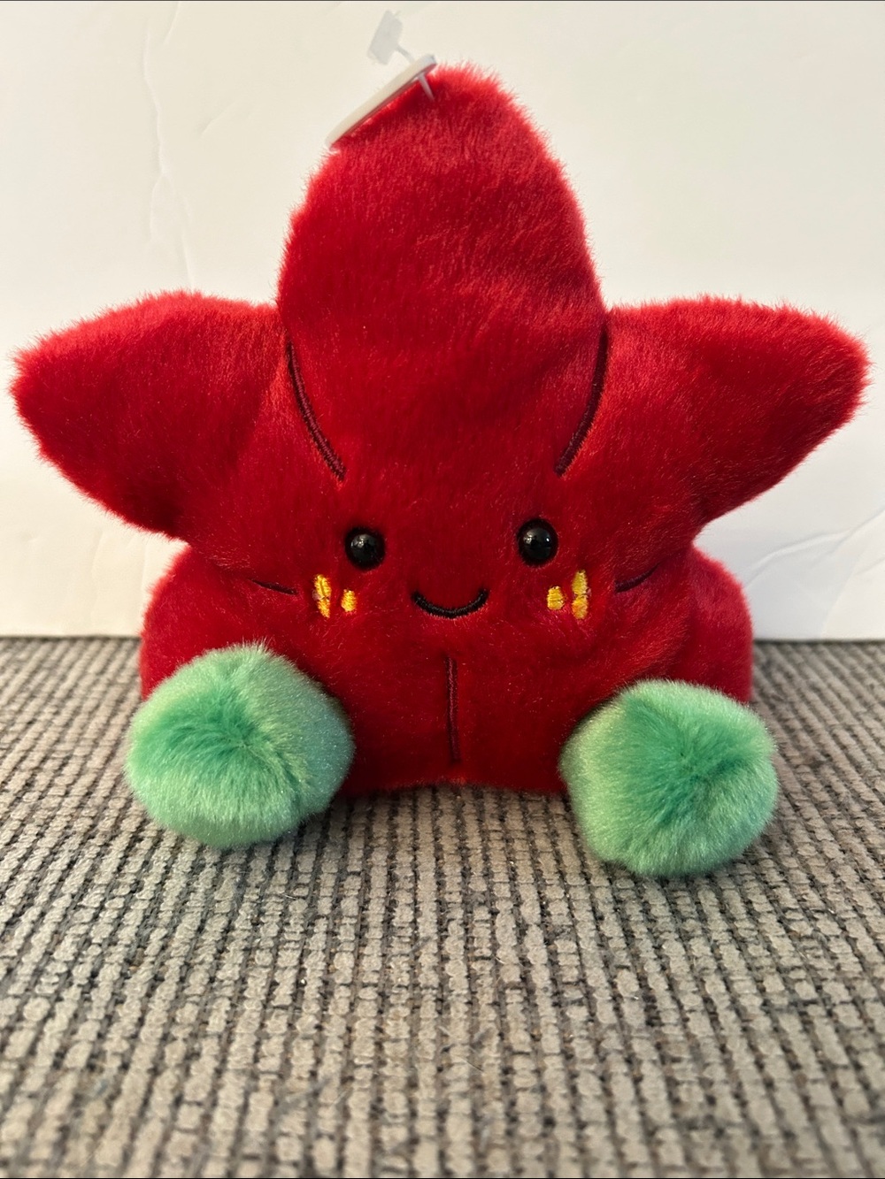 Aurora Palm Pals Carmine Poinsettia plush toy Christmas decoration